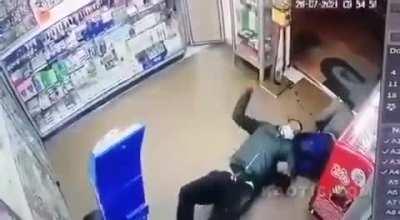 Two guys ambushed by an assassin in the store