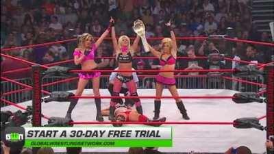 The Beautiful People stand over Tara