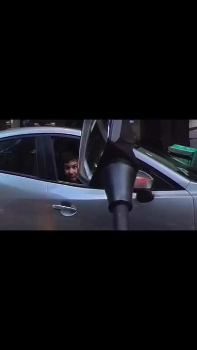 Man in Australia speeds through a red light without a care in the world.