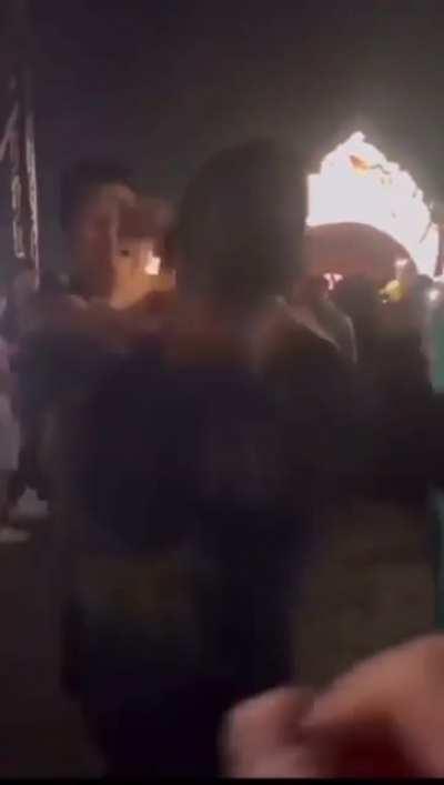 Guy throws a cup of urine at a group of people in Astroworld and gets beaten