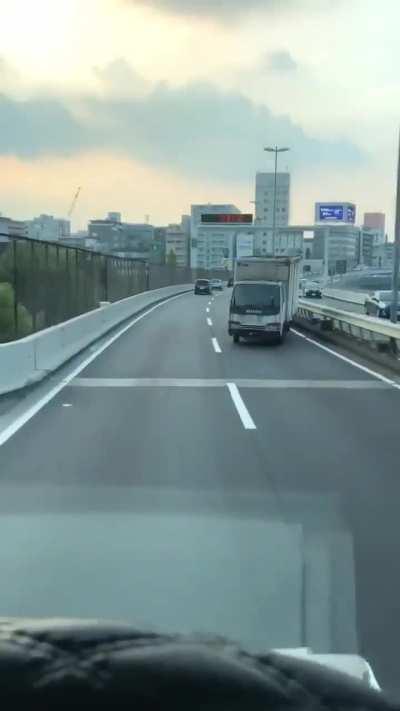 Truck in Japan drifting round the expressway
