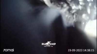 2 angles and aftermath of 2 heavy trucks colliding, driver of KamAZ (white truck) dies on impact