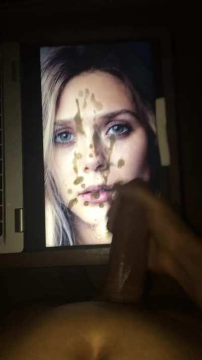 Covered Elizabeth Olsen’s beautiful face with cum