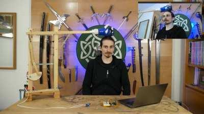 You redditors seem to have enjoyed my previous invention, so here's another! This robot reads my facial expression and punches me every time I stop smiling. I call this the 