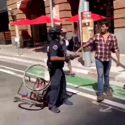 Gangs of LAPD Beating Up Peaceful Wheelchaired- Protestor