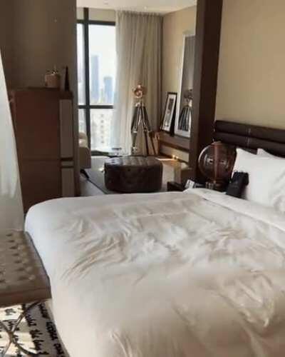 Nata Lee jumping on the bed