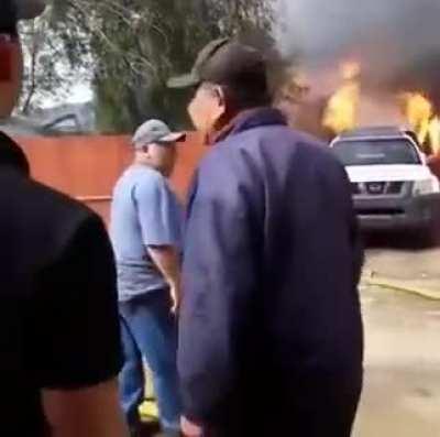 Dad runs into a burning building to save the family dog
