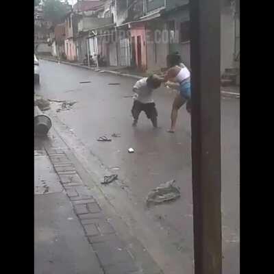 Woman and Little Person dukes it out in the streets of Brazil
