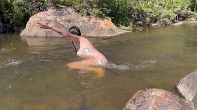Skinny dipping in a river