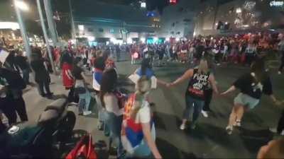Serbs play traditional dance in Melbourne in support of Novak Djoković