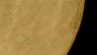 Fleet of UFOs flying across the moon