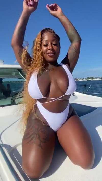 In white @barbee.bandz