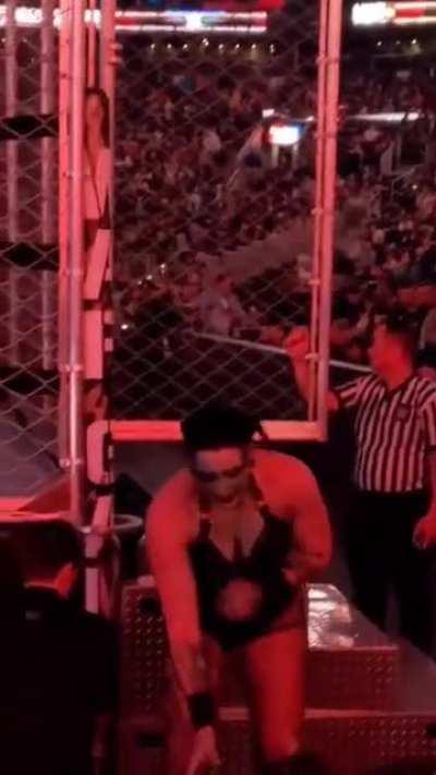 Rhea Ripley carrying Iyo Sky after WarGames