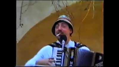 Austrian man yodeling fast as shit with cigarette in his mouth