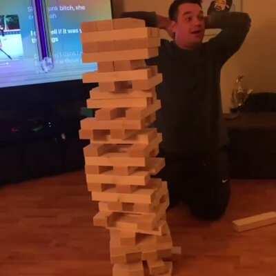 Playing Jenga in front of a TV