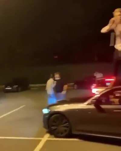 Jumping off the top of a car blindly with a door below partially open...