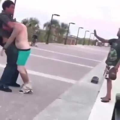 Insane Parler racist spits on black guy. Black guy takes him out in seconds. Cherry on top: He loses his pants.