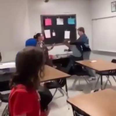 Two boys engage in fistfight until their classmate calms them down