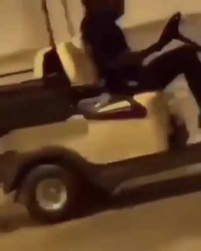 Driving a golf cart in a parking garage