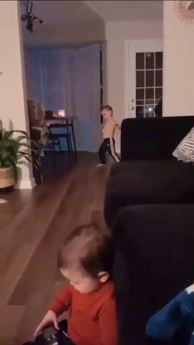 Little dude just summoned an ancient ball-throwing ability