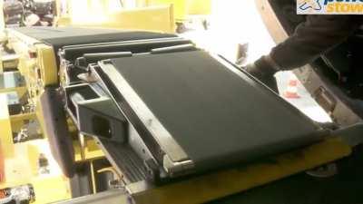 Belt loader extension built into belt conveyor to load/offload passenger baggage from aircraft cargo hold