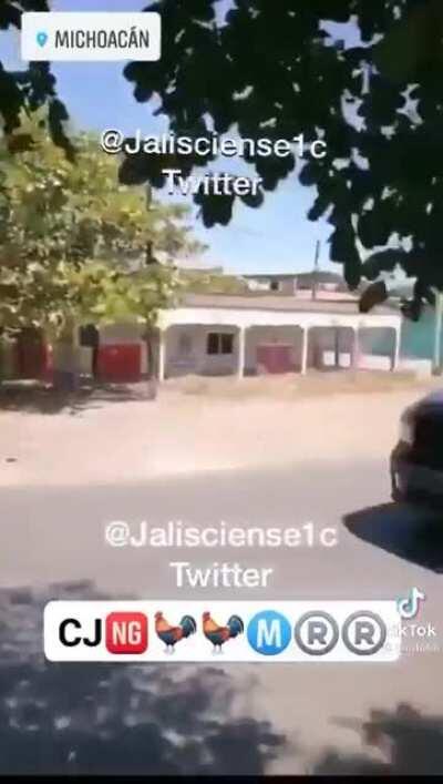 Mexican cartel armored trucks in some town