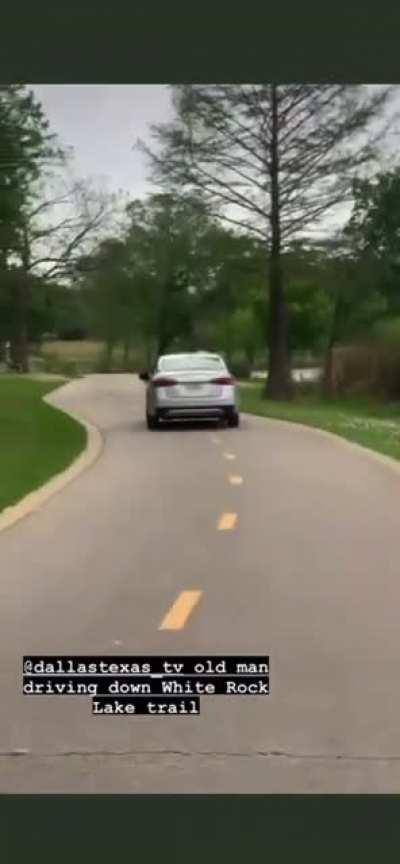Altima driver cruises down walking trail