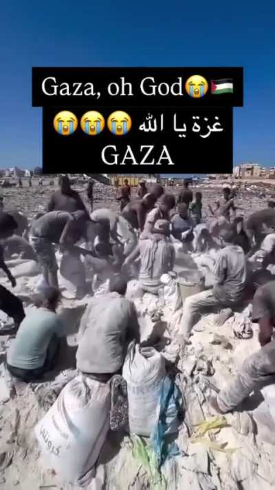 Desperate starving Palestinians dig through the dirt to get flour that they will use to try and feed their families. The whole world should be ashamed of allowing Israel to get away with this.