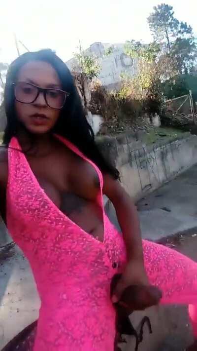 Renata Barbosa casually stroking outside.