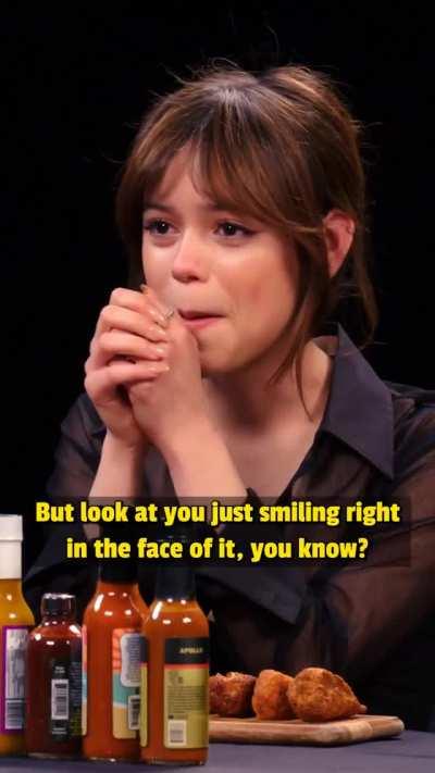 Jenna Ortega - Smiling right in the face of it