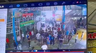 A group of men pull out guns and start firing outside Thai stadium because of alleged gambling dispute.