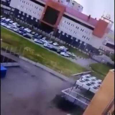 Car does a double backflip coming out of a parking garage