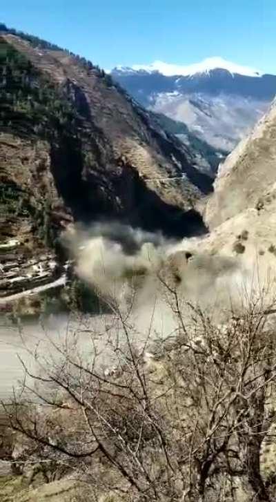A mountain flood taking out a bridge and everything else in its path (Uttarakhand, India)