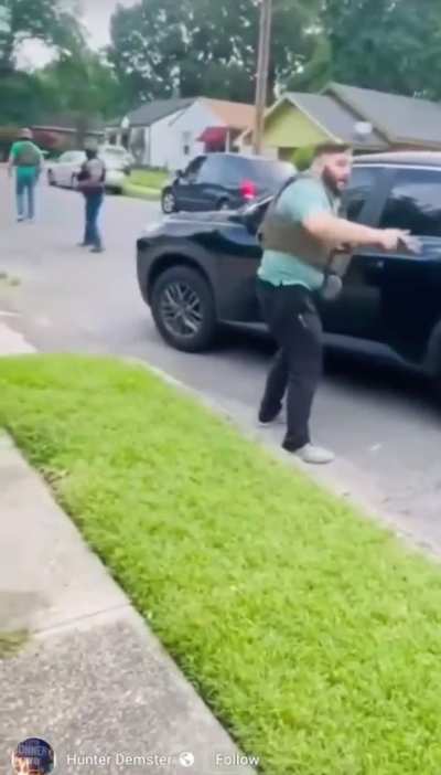 ICE agent in Memphis TN points gun at unarmed daughter of the man they are forcing into the back of their car