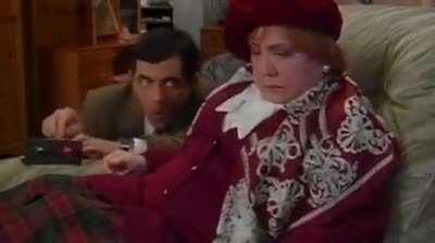 Mr. Bean using his electrical engineering skills for evil.