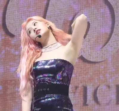 Sana - pink hair, shiny black tube dress