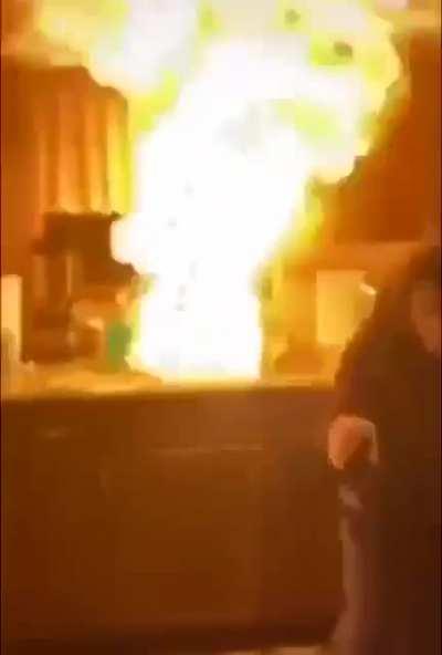 She wanted to put out a grease fire under the tap, causes flashover.