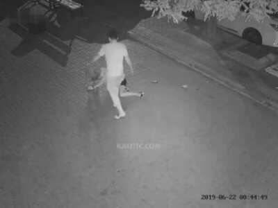 The man beat a woman