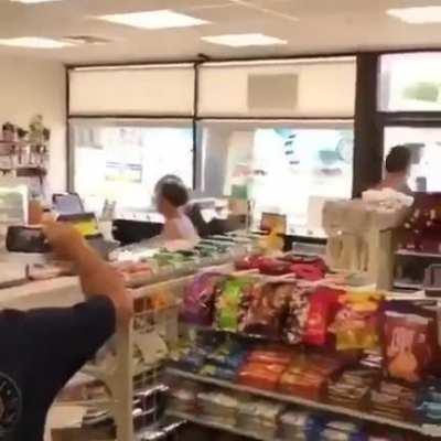 Women throws shopkeepers stuff at him.
