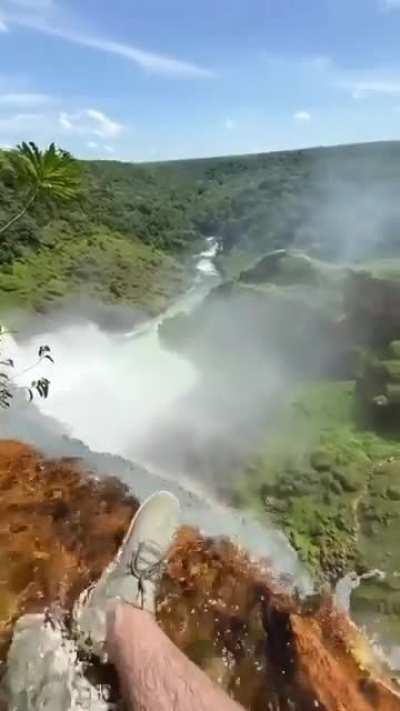Sitting on the Edge of A Huge Waterfall