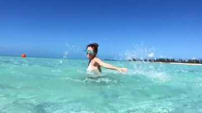 Amy spinning in the ocean