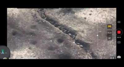Ukrainian artillery work on a trench filled with russians (reportedly up to 200) + aftermath of dozens liquidated