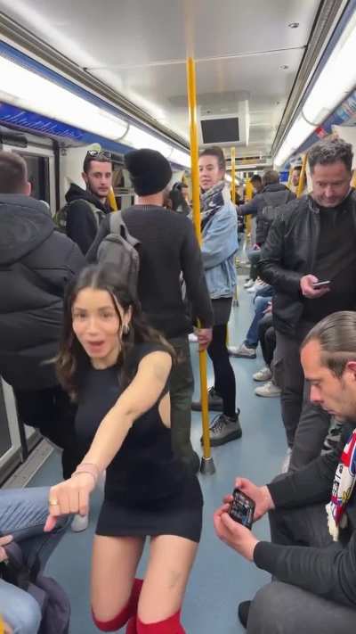 I'm sure there'd be much better places to dance and not bother the dude on his phone