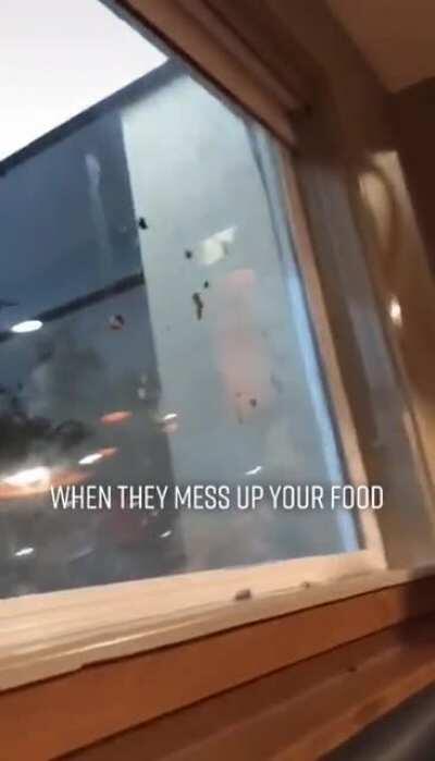 Man-child throws food at wall