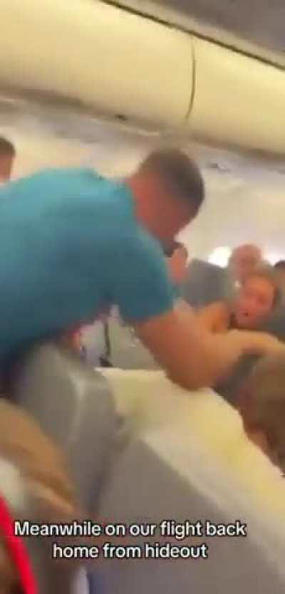 The man tried to open the door of a crowded Ryanair plane flying from Zadar in Croatia. When he ran to the door, two young men jumped on him and threw him to the floor.