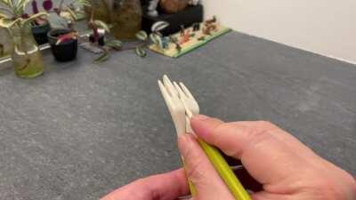 Fork and knife combine into chopsticks.