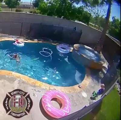 Toddler removes his life vest then jumps in the pool