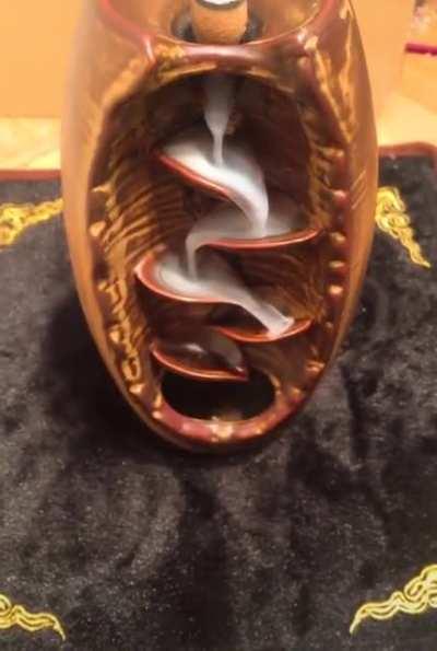 The smoke falls like water