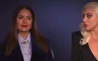 Salma Hayek listening to Lady Gaga explain her approach to acting at length