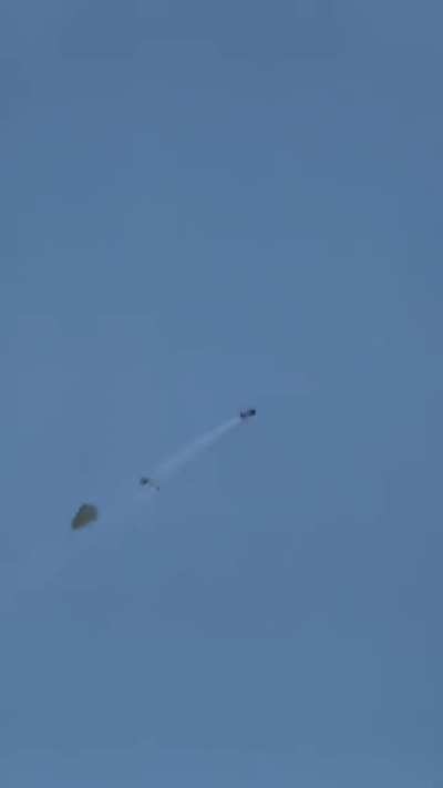 A teacher and his students built a 2 stage rocket from plastic bottles and powered by water pressure.